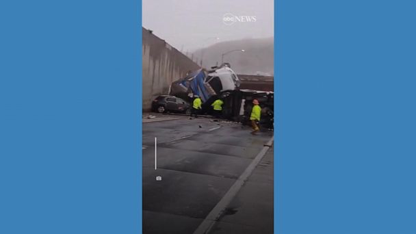 WATCH:  Truck tumbles over freeway onto wreckage from earlier crash