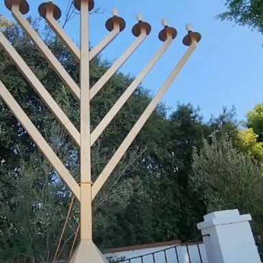 The suspect, Eric Brian King, has been arrested after allegedly vandalizing and carving a Nazi symbol onto a menorah at a Beverly Hills home, police said. 