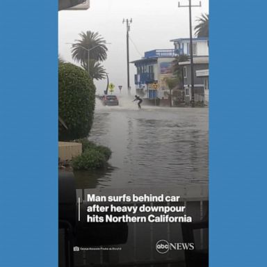 VIDEO: Man surfs behind car after heavy downpour hits Northern California