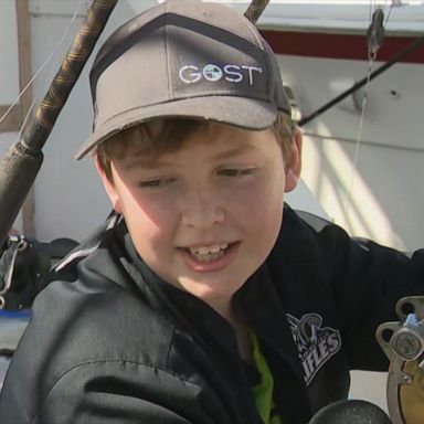 The 12-year-old was on a fishing trip when he hooked a 10-foot great white shark.