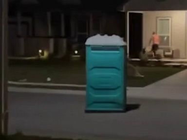 WATCH: Portable toilet glides down street during Texas storm