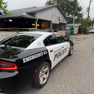 The shooting occurred Friday night at a restaurant on a busy strip in downtown Ocean Springs, Mississippi.