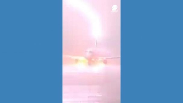 Video Lightning strikes tail of aircraft