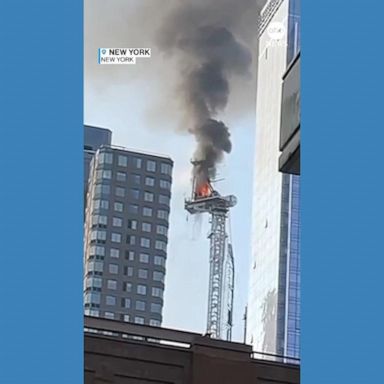 VIDEO: Crane catches fire, partially collapses in midtown Manhattan