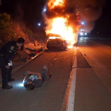 PHOTO: The driver was dragged to safety from his burning car on a California highway.