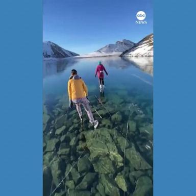 VIDEO: Skaters glide over 'ice window' frozen lake