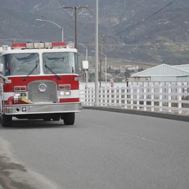 VIDEO: Trucker rescued after dangling from overpass