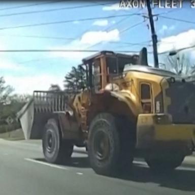 VIDEO: Police say an ex-employee led police on a slow-speed chase of a stolen front-loader