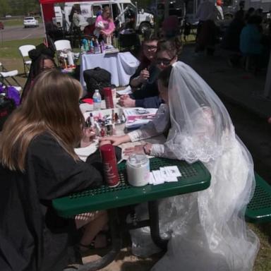 VIDEO: Couples tie the knot at Total Eclipse of the Heart Festival