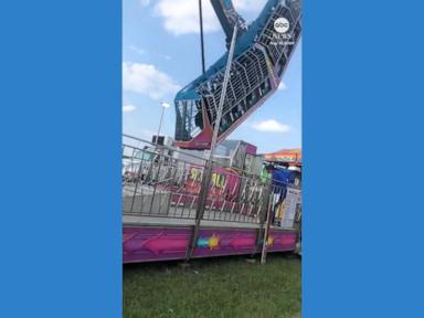 WATCH:  Carnival worker makes amazing save after rider drops phone