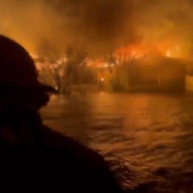 VIDEO: Crews navigate floodwaters and house fire to rescue people in wake of Hurricane Helene