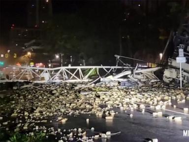 WATCH:  Crane smashes into building during Hurricane Milton