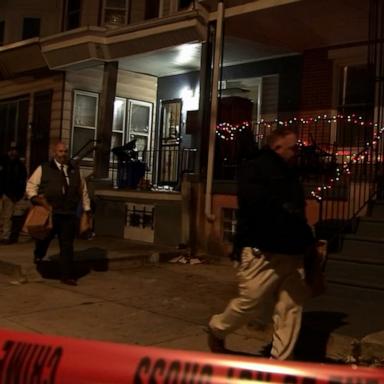 A mother is in critical condition and her son has been killed in a home invasion shooting in a Philadelphia suburb. The suspect is at large and has not been identified, officials said. 