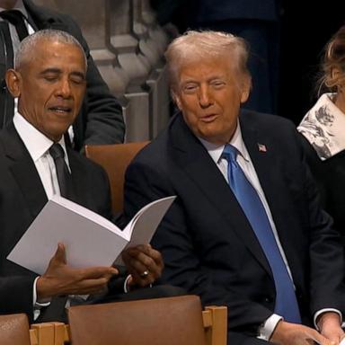 VIDEO: Obama, Trump sit together, talk before Carter funeral