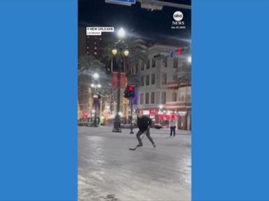 WATCH:  Skater plays hockey on icy Canal Street in New Orleans