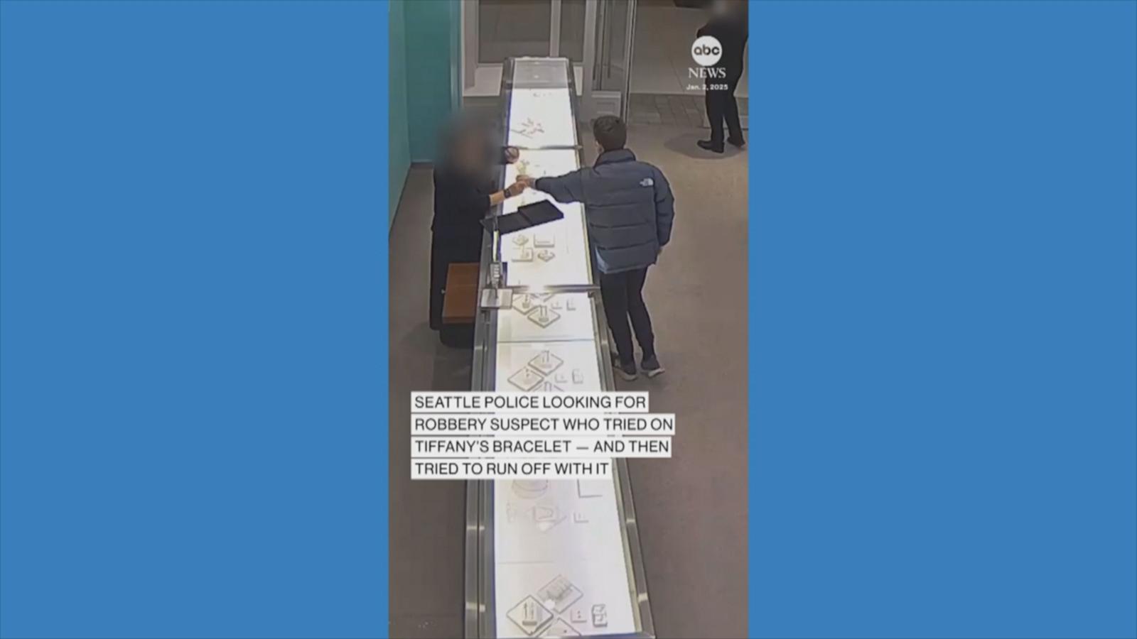 WATCH:  Robbery suspect tried on Tiffany’s bracelet, then tried to run off with it