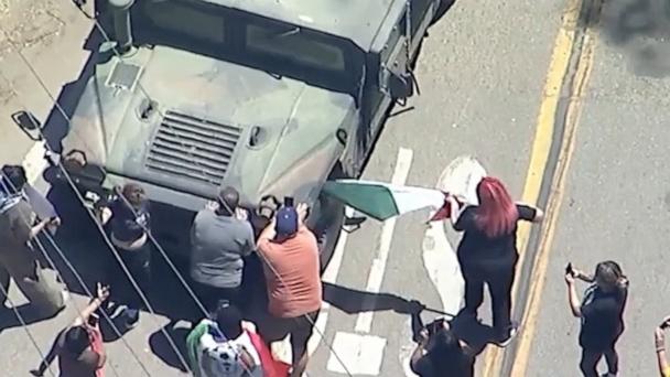 Federal agents clash with protesters during ICE raid at Southern California farm