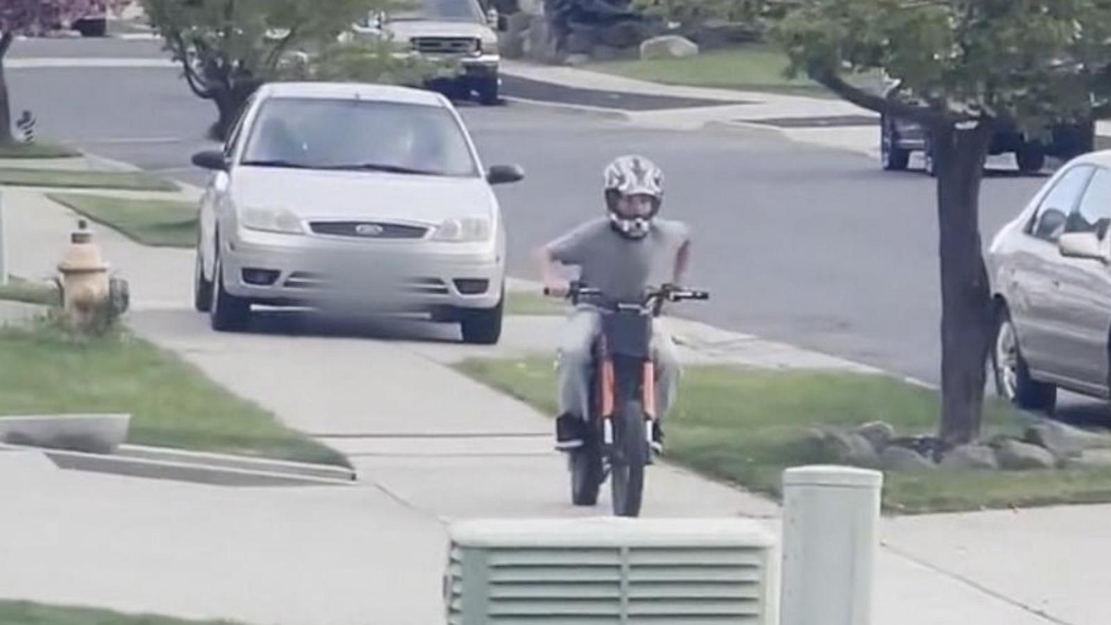 WATCH:  Woman arrested after driving on sidewalk toward child riding bike, police say