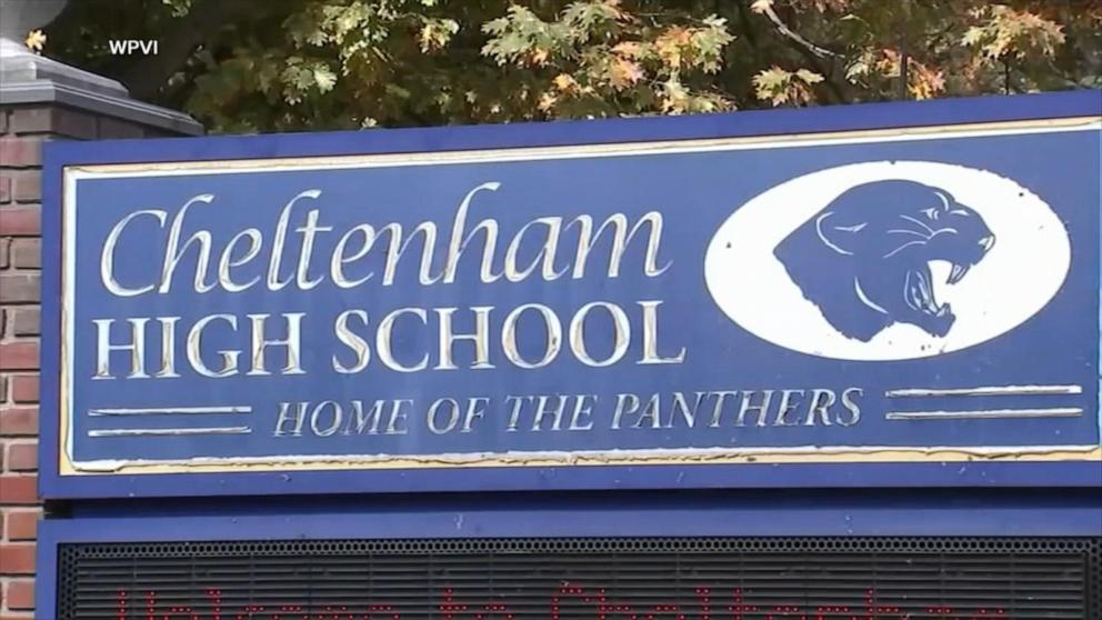 Four former football coaches and six players at a Pennsylvania high school face criminal charges in connection with alleged locker room assaults on a teammate.