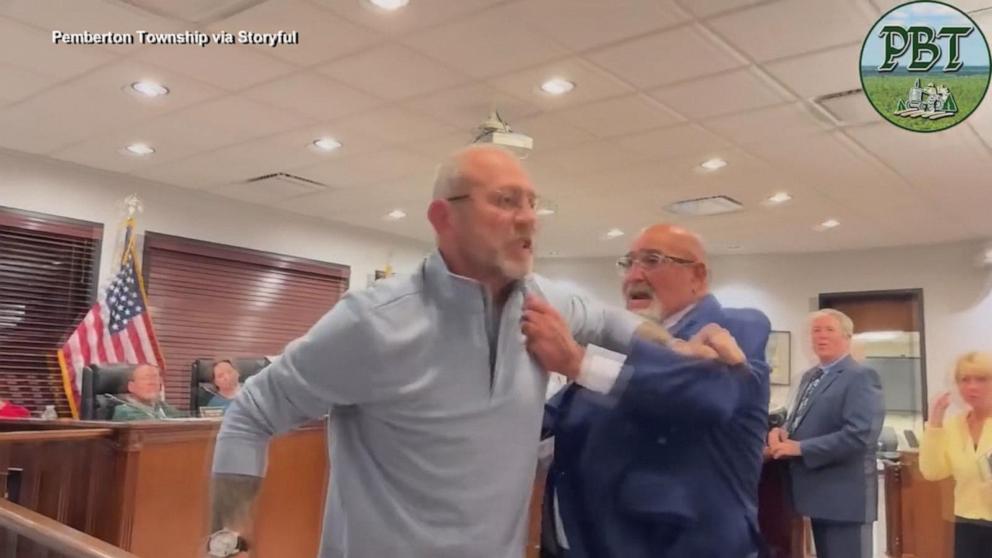 NJ mayor charges at critic during town hall