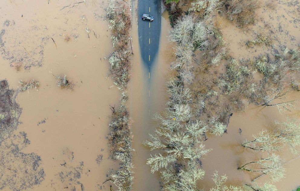 PHOTO: A vehicle turns around on a flooded road in Sebastopol, Calif, Jan. 05, 2023.