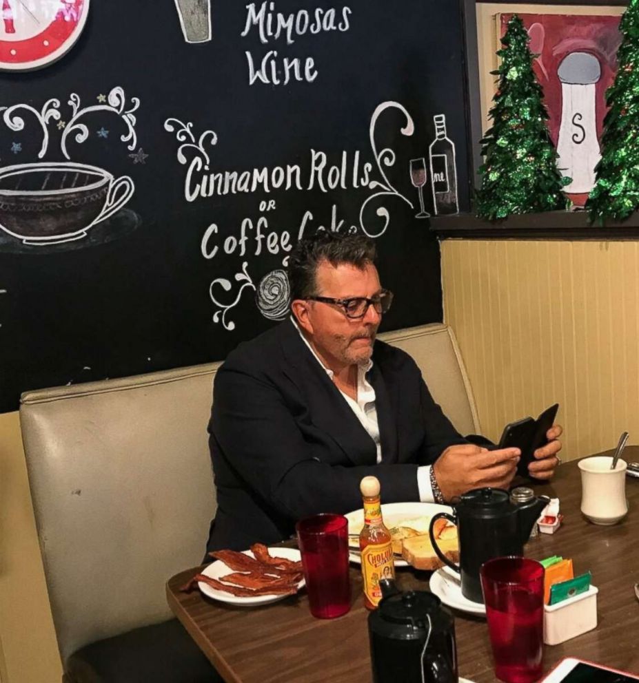 PHOTO: Dwayne Clark, CEO of Aegis Living, eating his usual breakfast at the Brief Encounter Cafe in Bellevue, Washington, on Dec. 18th after he left a generous tip for the staff over the weekend.