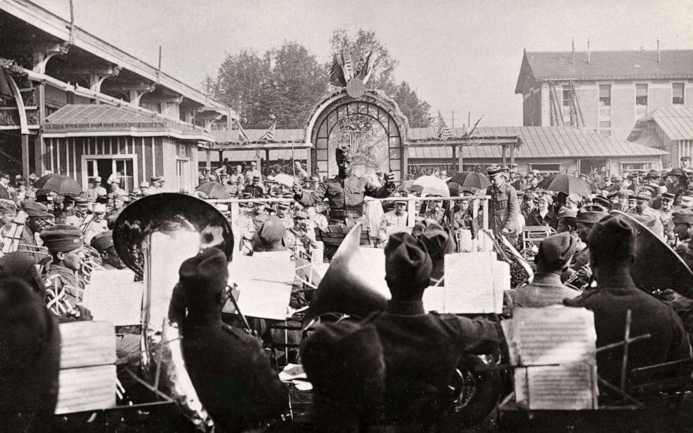 PHOTO: The 369th Infantry Regiment performs during an Independence Day concert directed by conductor Lt. James Reese Europe, in Chalons-sur-Marne, France, 1918. 