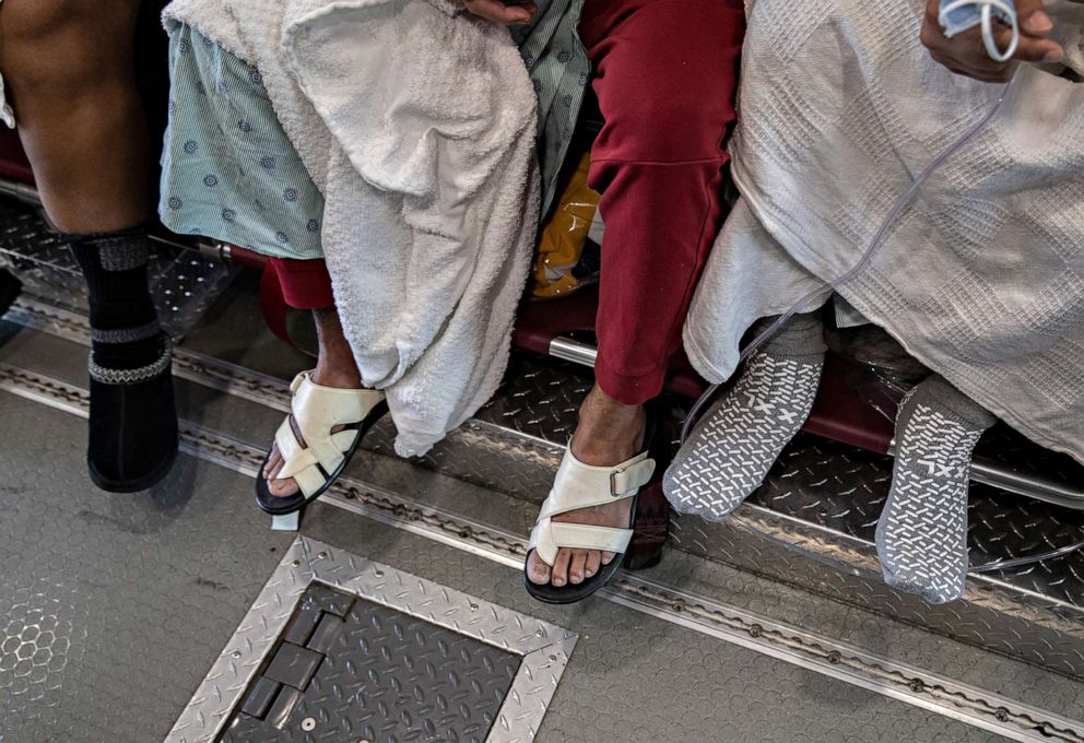 PHOTO: Patients travel in a bus, known as a Medical Evacuation Transport Unit (METU), to Montefiore Medical Center (Moses Campus), on April 7, 2020, in the Bronx borough of New York City.