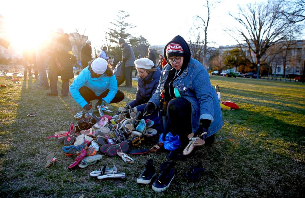 PHOTO: Members of the AVAAZ group install 7000 shoes on the lawn in front of the U.S. Capitol in Washington, March 13, 2018. The shoes represents the number of lives lost since the shooting at Sandy Hook elementary in Newtown, Ct.