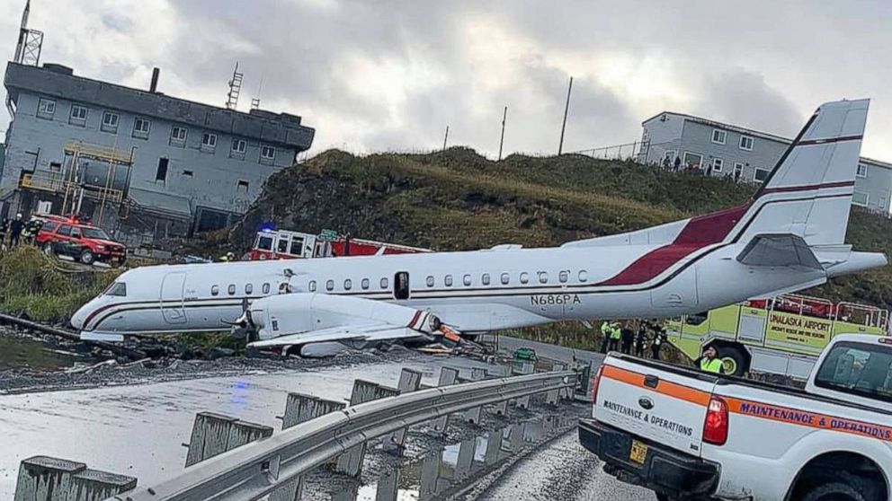 PHOTO: Alaska Airlines Flight 3296, operated by Peninsula Airways, sits at the edge of Unalaska Bay after running off the runway while landing at Unalaska/Dutch Harbor Airport, Oct. 18, 2019.  