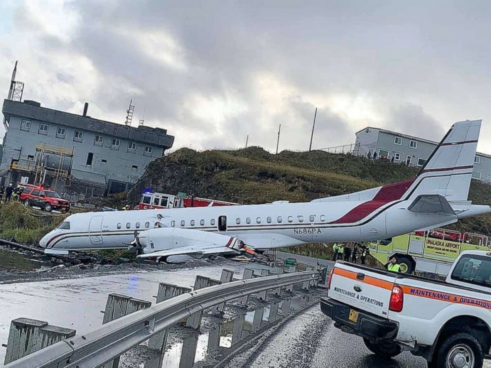 PHOTO: Alaska Airlines Flight 3296, operated by Peninsula Airways, sits at the edge of Unalaska Bay after running off the runway while landing at Unalaska/Dutch Harbor Airport, Oct. 18, 2019.