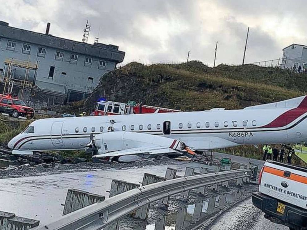 PHOTO: Alaska Airlines Flight 3296, operated by Peninsula Airways, sits at the edge of Unalaska Bay after running off the runway while landing at Unalaska/Dutch Harbor Airport, Oct. 18, 2019.  