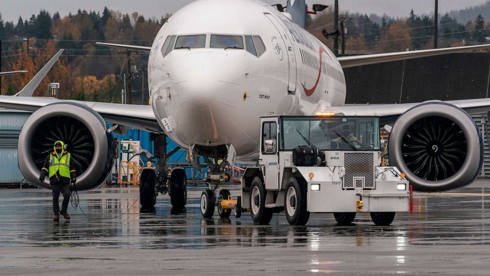 PHOTO: A Boeing 737 MAX is towed toward the runway for a test flight near the company's factory in Renton, Wash., Nov. 18, 2020.