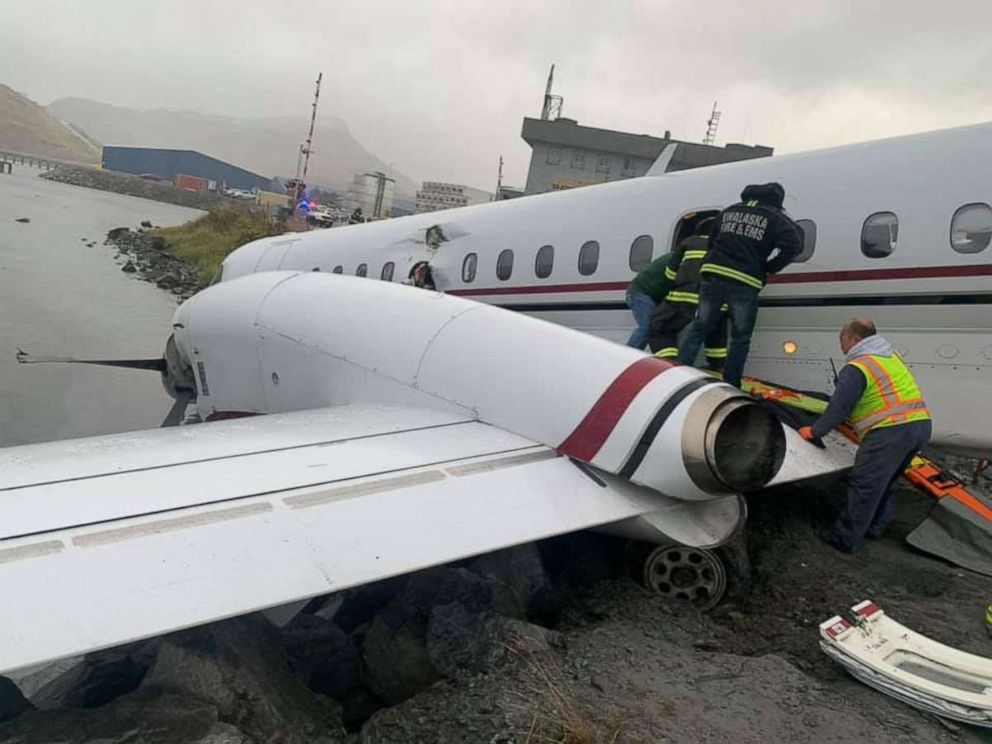 PHOTO: Alaska Airlines Flight 3296, operated by Peninsula Airways, sits at the edge of Unalaska Bay after running off the runway while landing at Unalaska/Dutch Harbor Airport, Oct. 17, 2019.