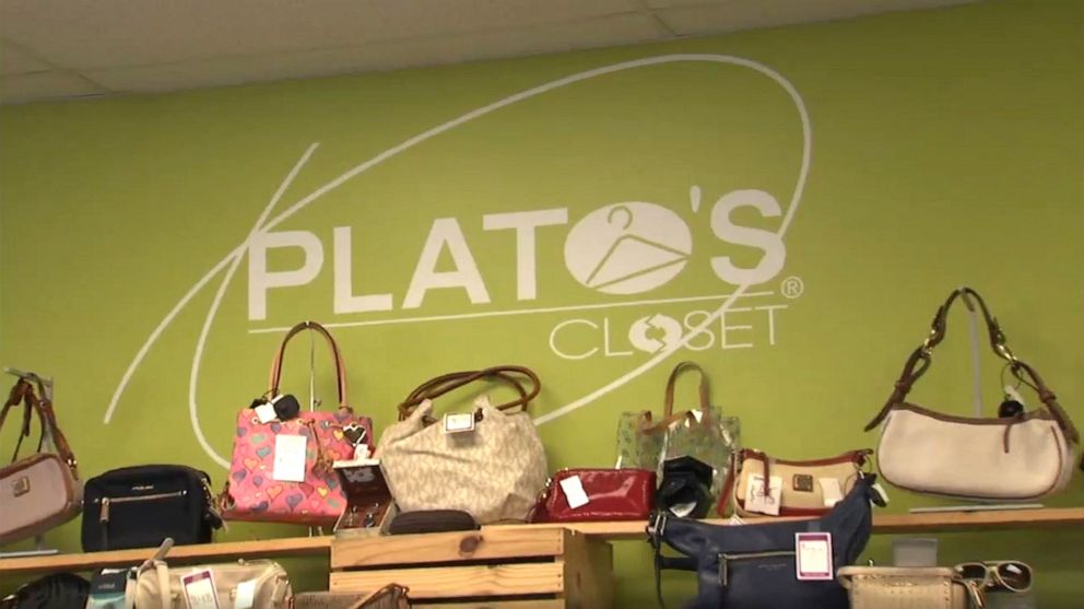 PHOTO: A sign displays the name of Plato's Closet, a thrift and consignment store in Valparaiso, Indiana, where a store employee discovered $7,000 in a coat and then returned it to a customer, Oct. 24, 2019.