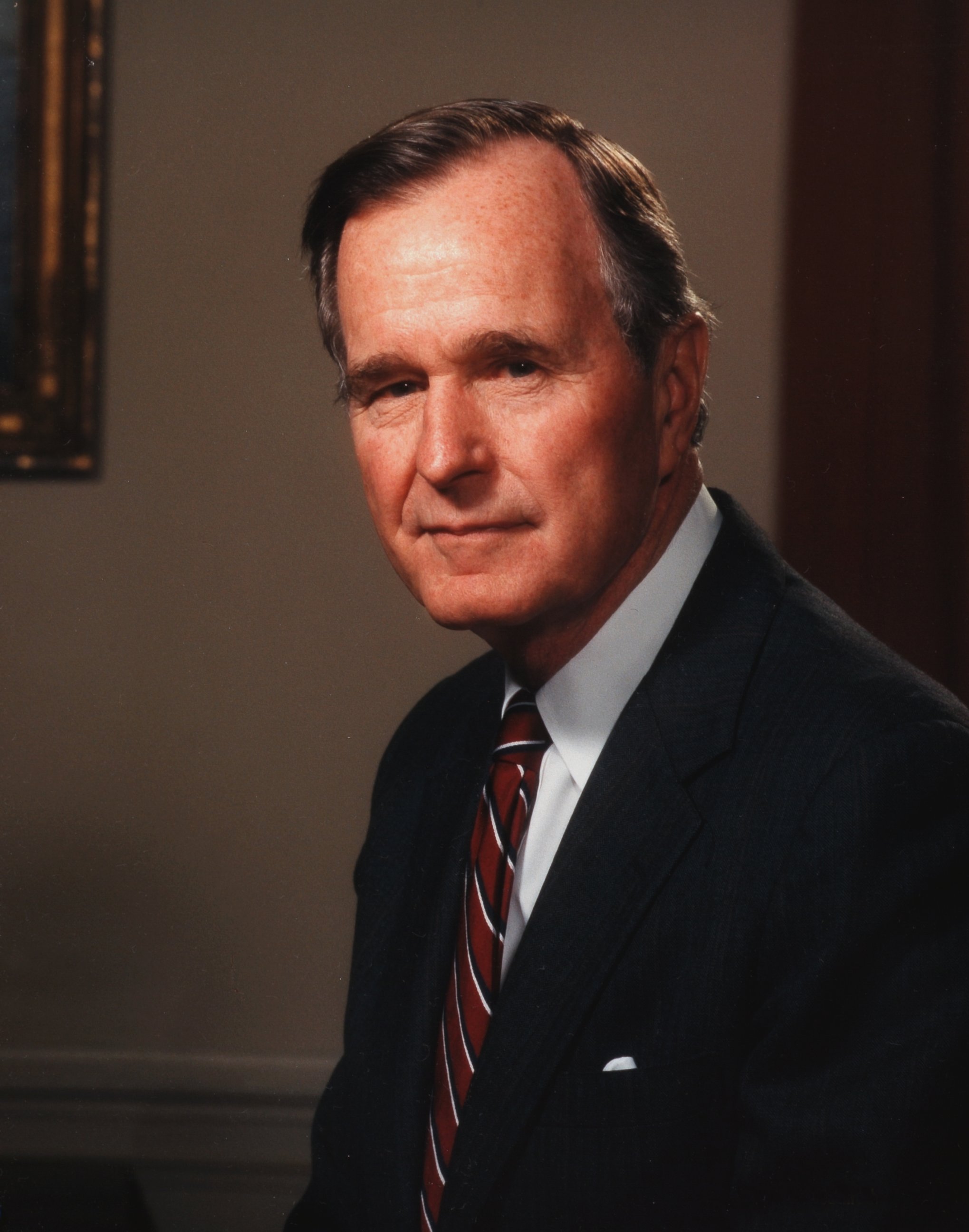PHOTO: A portrait of American politician George Herbert Walker Bush, the 41st President of the United States, in the Oval Office, Washington, D.C., 1991.