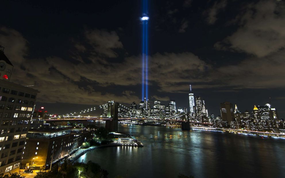 PHOTO: Tribute in Light illuminate the New York City sky between the Twin Towers of the World Trade Center in New York to mark the 14th anniversary of the 2001 terrorist attacks on Sept. 11, 2015.