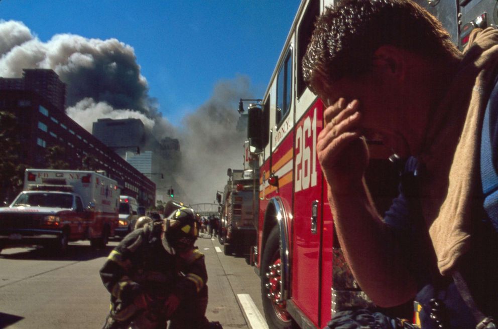 PHOTO: New York City Firefighters near the site of the World Trade Center following the attacks, Sept. 11, 2001. 