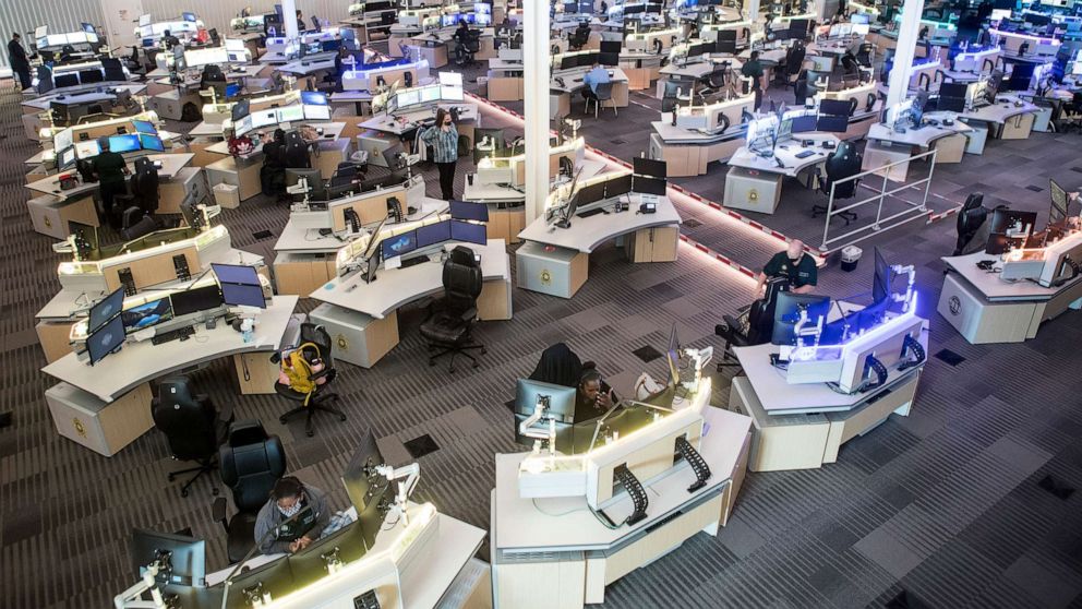 PHOTO: Communications officers work in the Harris County 911 Call Center, May 18, 2021, in Houston.