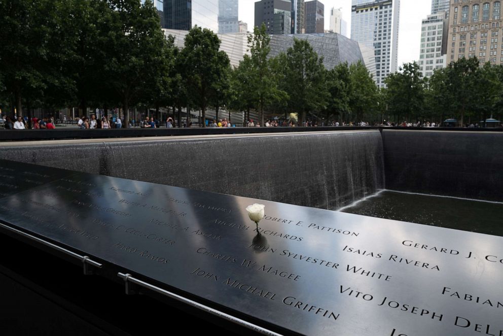 PHOTO: A rose is placed on a victims name at The National September 11 Memorial & Museum, Aug. 2, 2022, in New York.