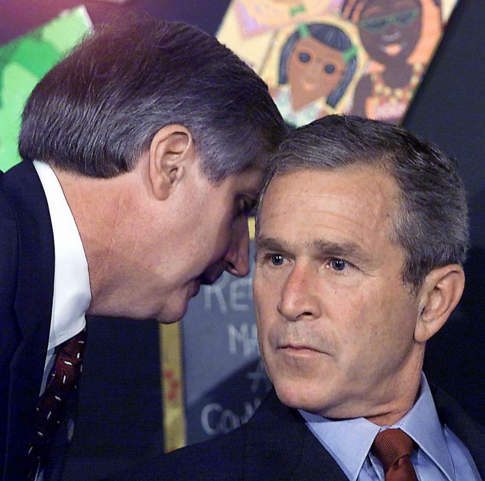 PHOTO: Chief of Staff Andrew Card whispers in President George W. Bush ear, interrupting a morning school reading event, Sept. 11, 2001, shortly after news of the attacks on the World Trade Center in New York City.