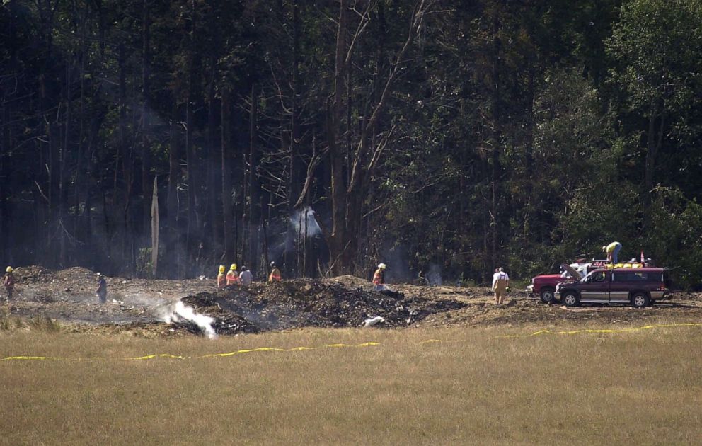 PHOTO: Emergency personnel mark off the crash site of United Airlines Flight 93 near Shanksville, Pa., Sept. 11, 2001. 