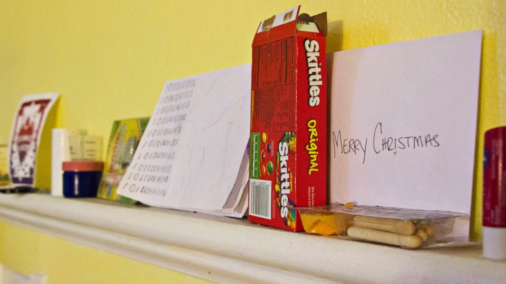 PHOTO: A box of Skittles and other possessions belonging to Javier Fores Garcia and his son. 