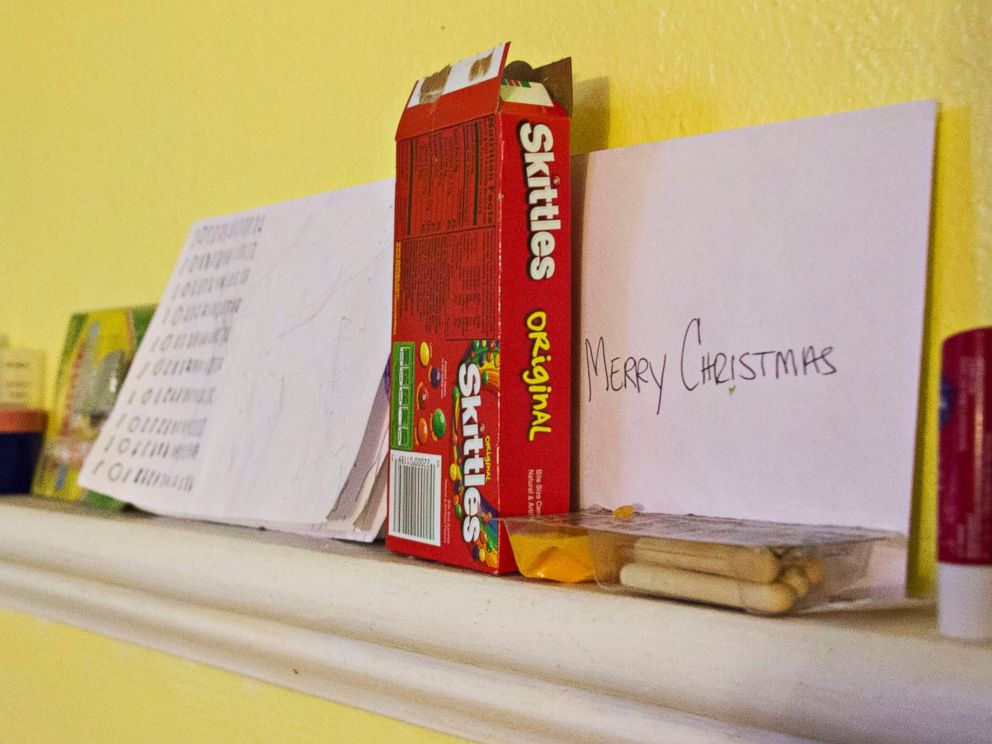 PHOTO: A box of Skittles and other possessions belonging to Javier Fores Garcia and his son.