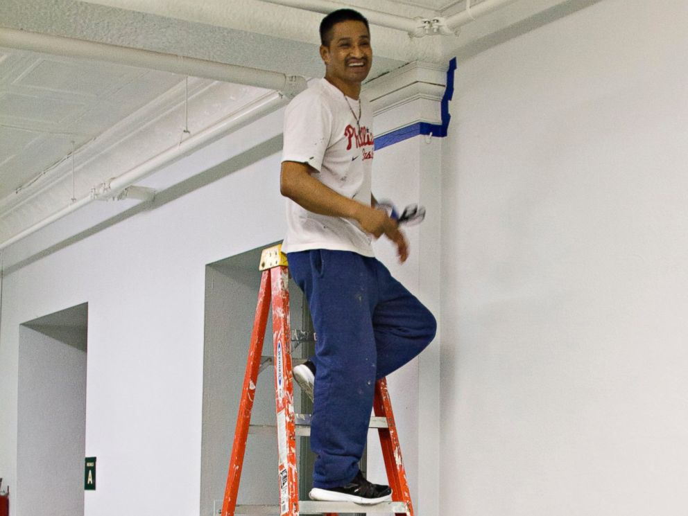 PHOTO: Javier Flores Garcia used to work outdoors as an arborist. Now he does odd jobs around the church, including painting. The church has been supporting Garcia and his family while he is in sanctuary.