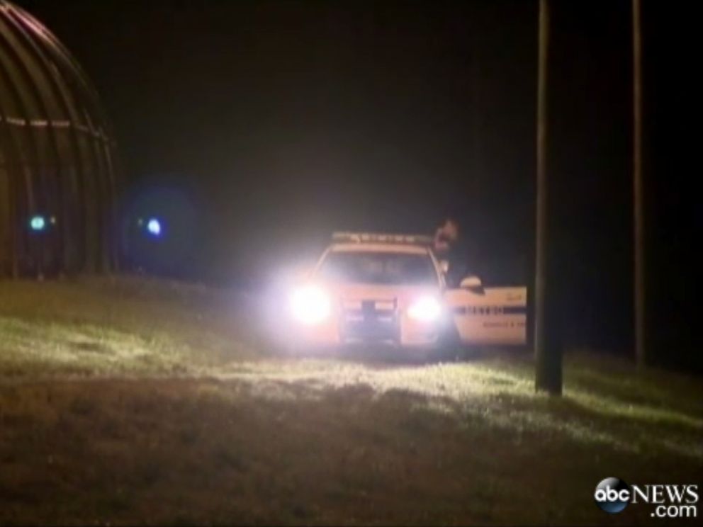 PHOTO: Police stood guard outside the fence at the Woodland Hills Youth Development Center in Nashville, Tenn., after teens broke out of their dorms, Sept. 4, 2014.