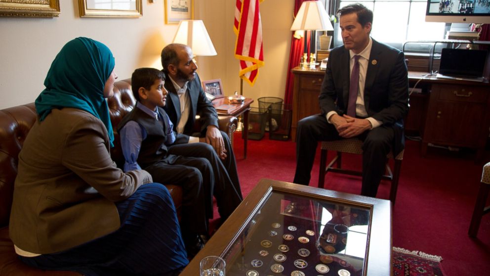 PHOTO: Ahmad Alkhalaf, 9, sits with his father, center right, Nadia Alawa, executive director at NuDay Syria, and Congressman Seth Moulton. 