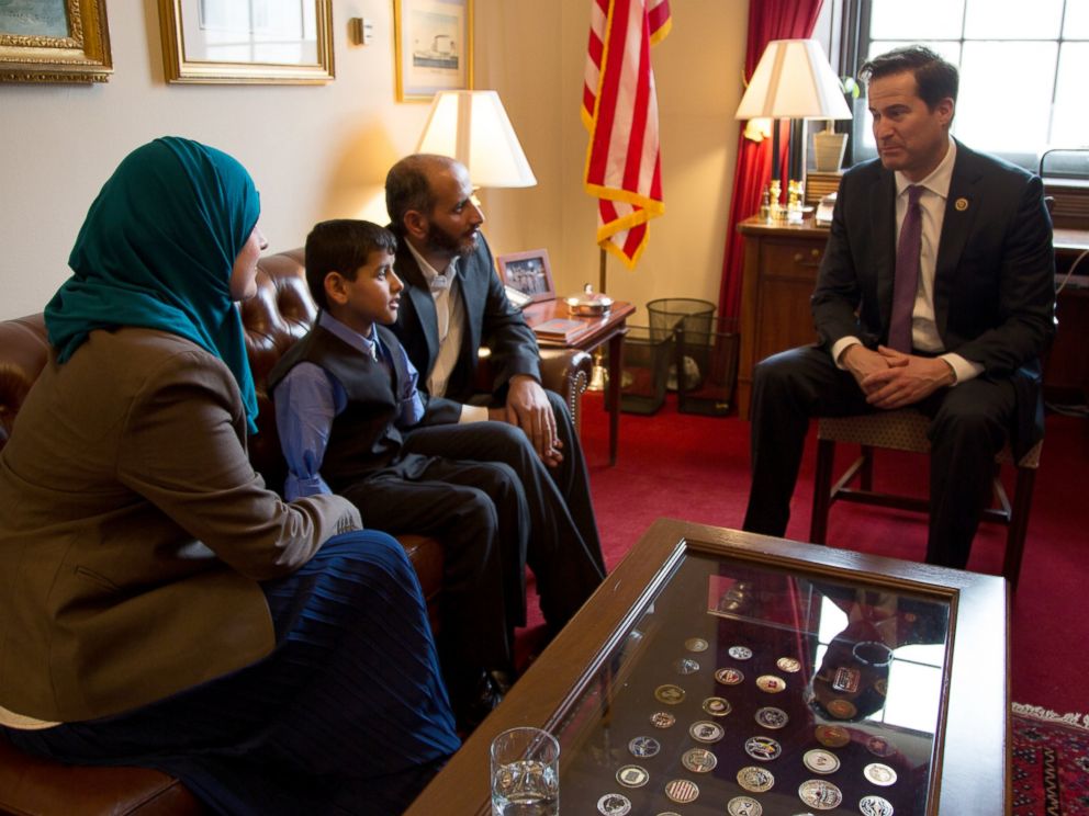 PHOTO: Ahmad Alkhalaf, 9, sits with his father, center right, Nadia Alawa, executive director at NuDay Syria, and Congressman Seth Moulton.