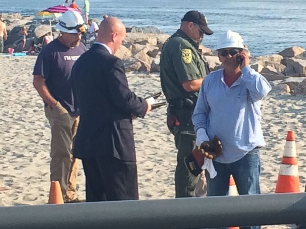 PHOTO: On July 13, 2015, investigators dug up an electrical line running underneath the Salty Brine State Beach in Narragansett, Rhode Island.
