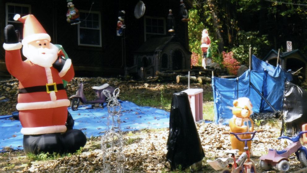 PHOTO: Various decorations, including a hanging Mickey Mouse and a Santa Claus, are pictured here on Bill Ansell's yard.